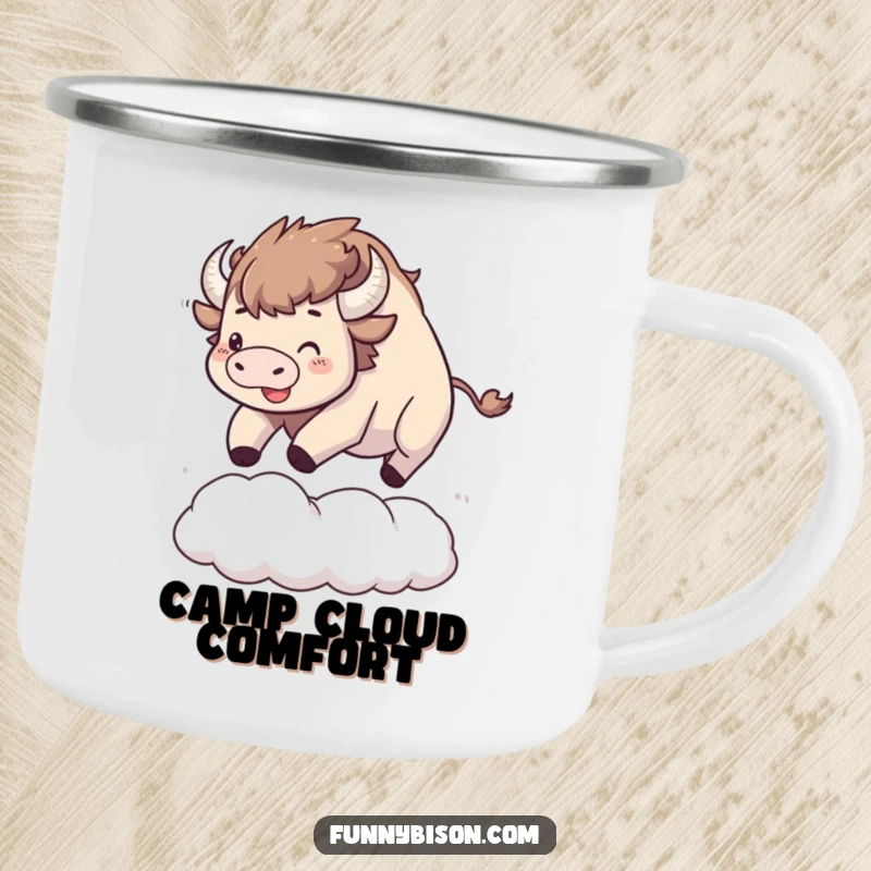 Funny Kawaii bison camping mug showing a happy bison bouncing on a large, soft cloud, perfect for cheerful outdoor adventures.
